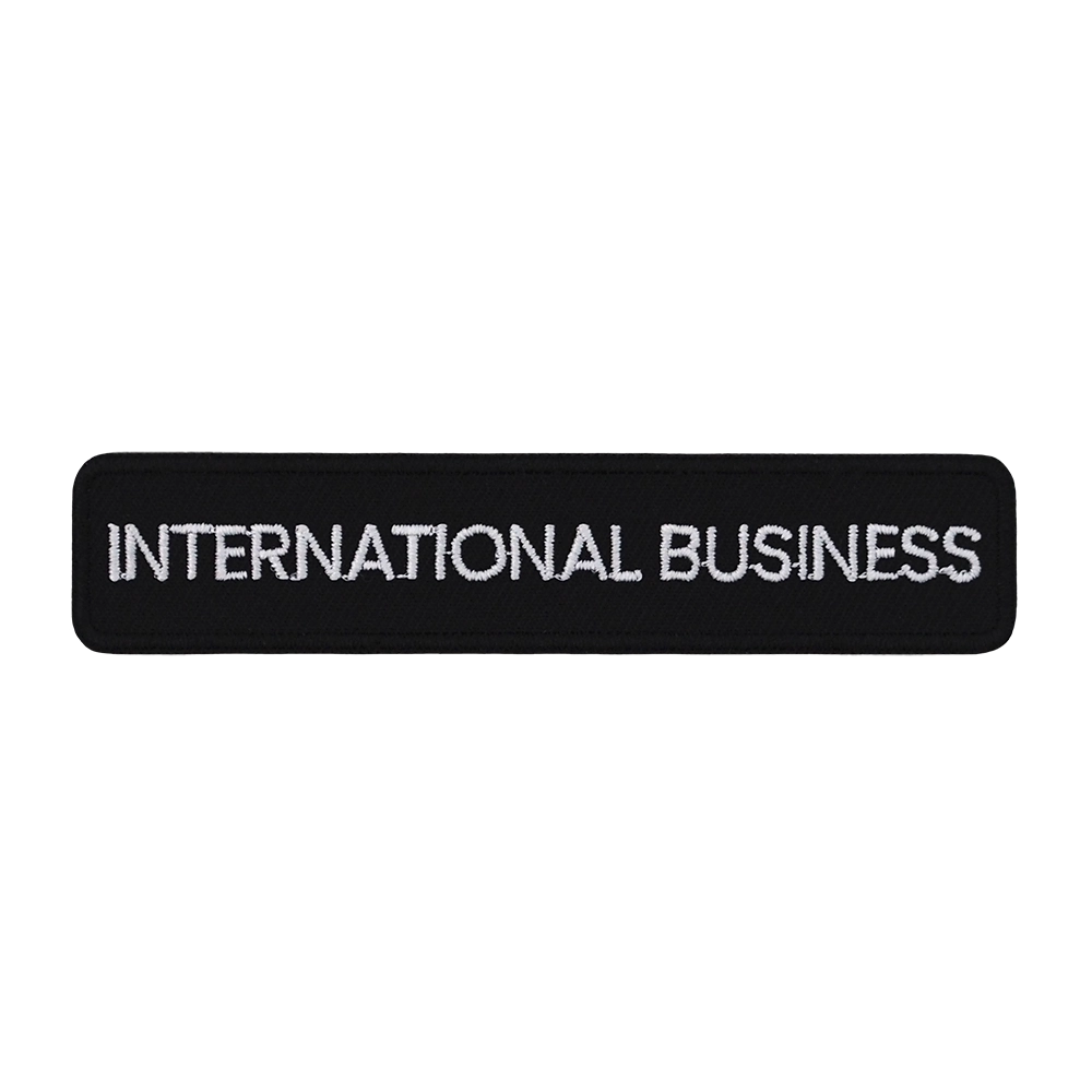 Brodeerattu haalarimerkki, international business.