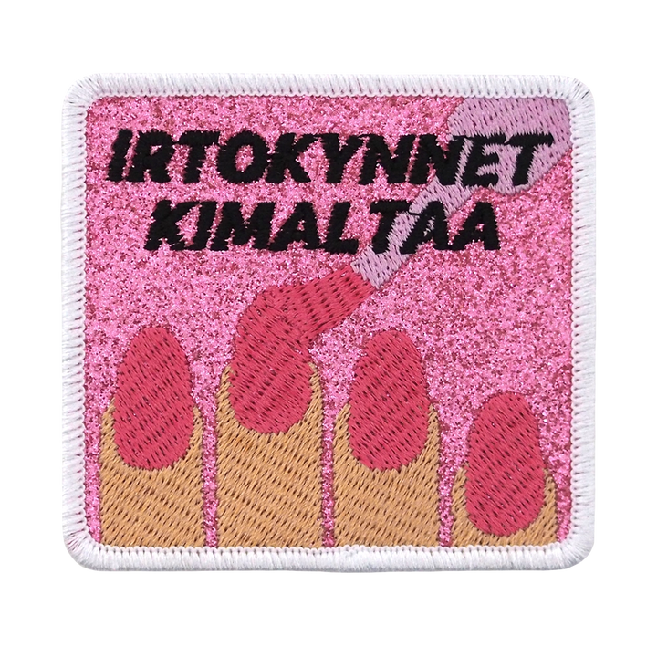 Brodeerattu merkki glitterkankaalla, kynsilakkaa, teksti: Irtokynnet kimaltaa.