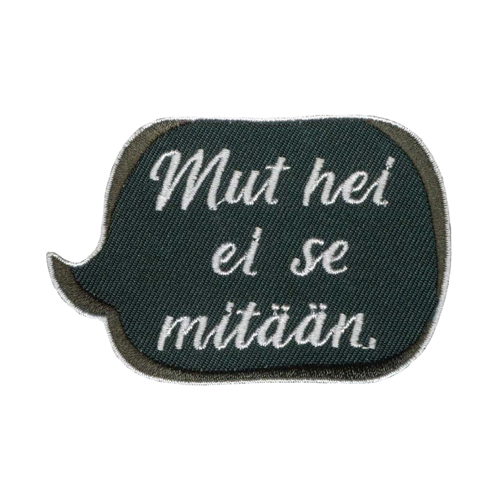 Brodeerattu kangasmerkki, teksti: Mut hei ei se mitään.