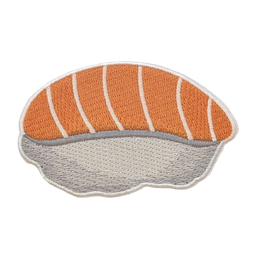 Brodeerattu sushi haalarimerkki, sushin muotoinen.